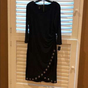 Black dress with designed gold holes